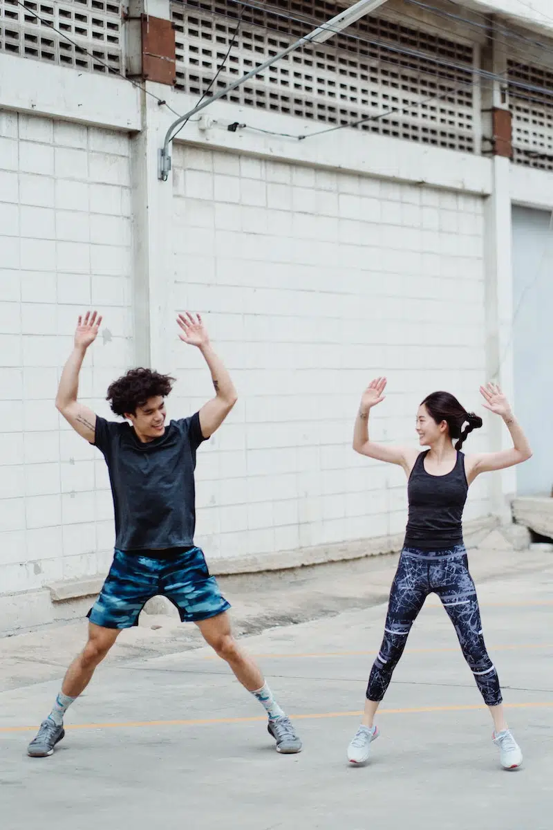 A Couple Exercising Together